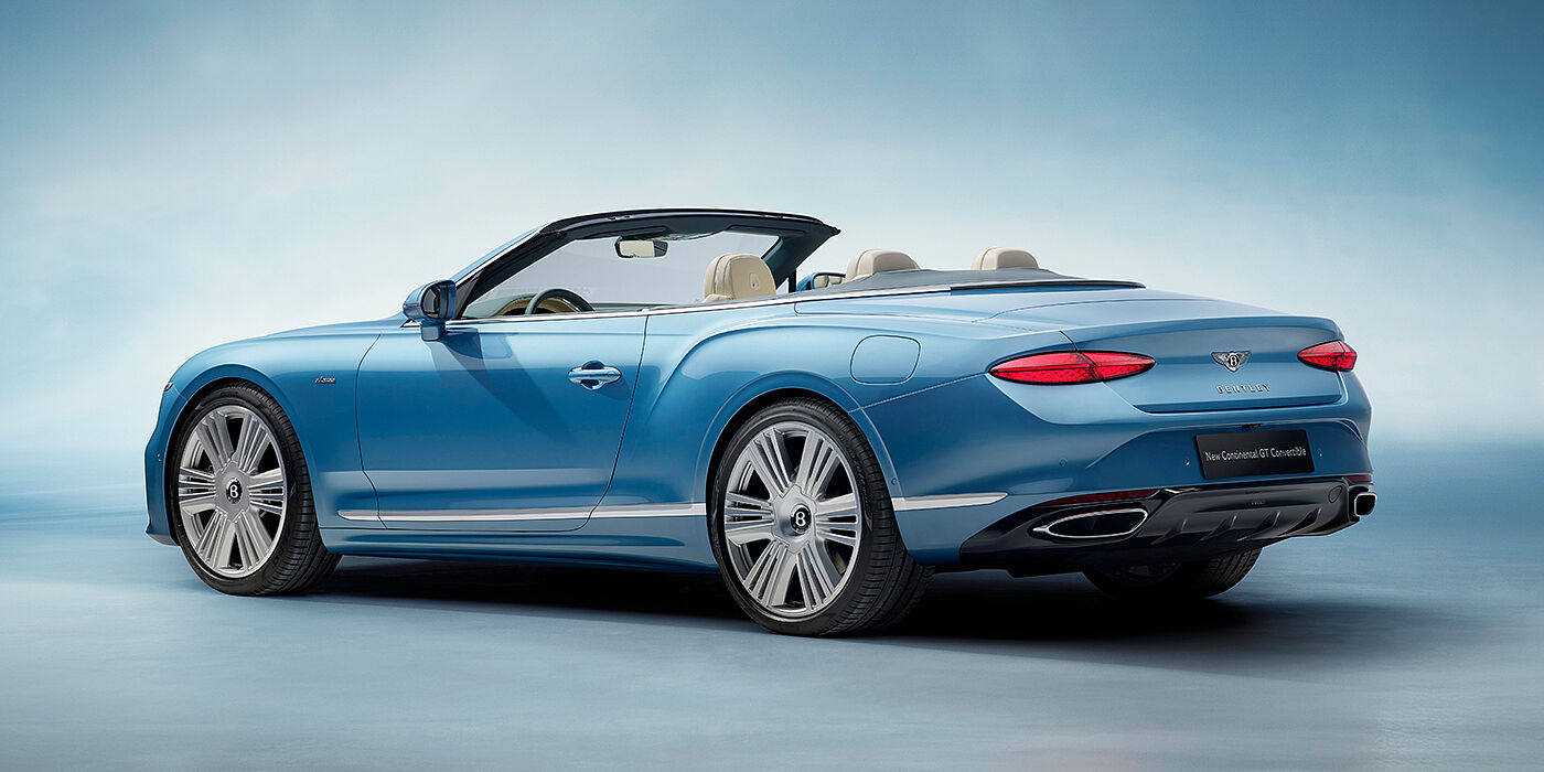 Bentley Bordeaux New Bentley Continental GTC Azure convertible rear view in Light Windsor blue paint with 22 inch ten spoke wheels and chrome exterior details