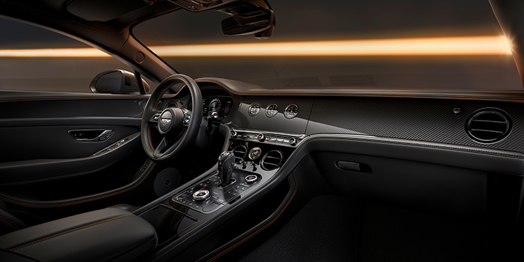 Bentley Bordeaux Bentley Continental GT Black Edition coupe front interior with Beluga black hide and High Gloss Carbon Fibre veneer