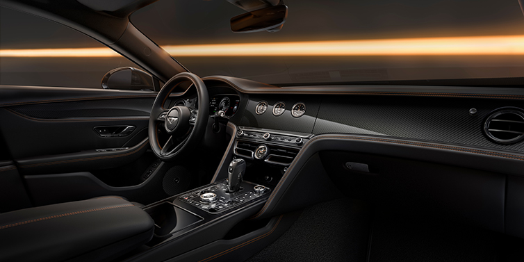 Bentley Bordeaux Bentley Flying Spur Black Edition sedan front interior in Beluga black hide with High Gloss Carbon Fibre veneer